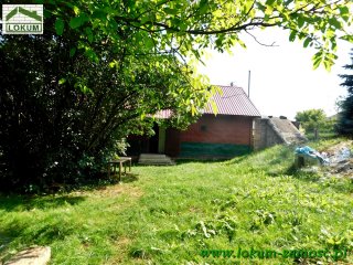 DOM W KRYNICACH NAD ZALEWEM. DZIAŁKA 0,48 HA. 